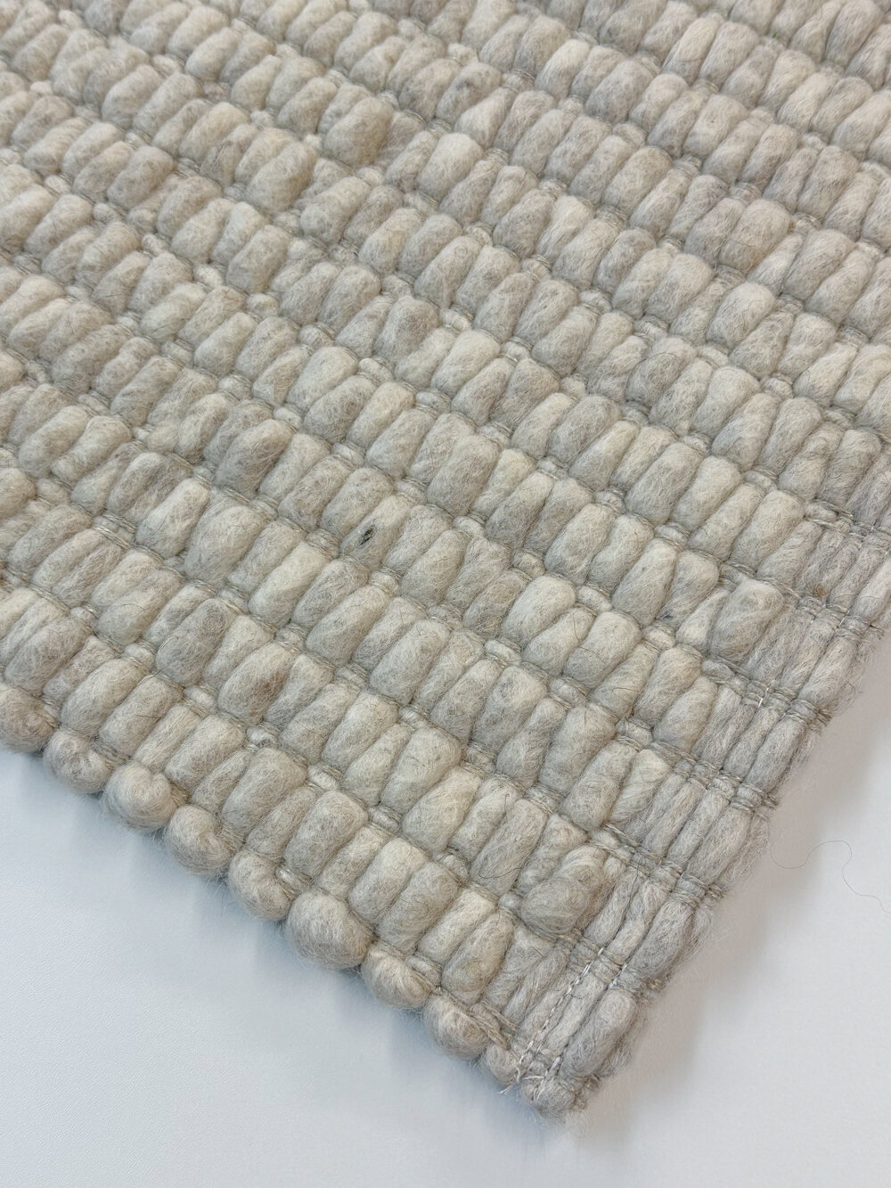 Schafwollteppich Muschel-Bindung