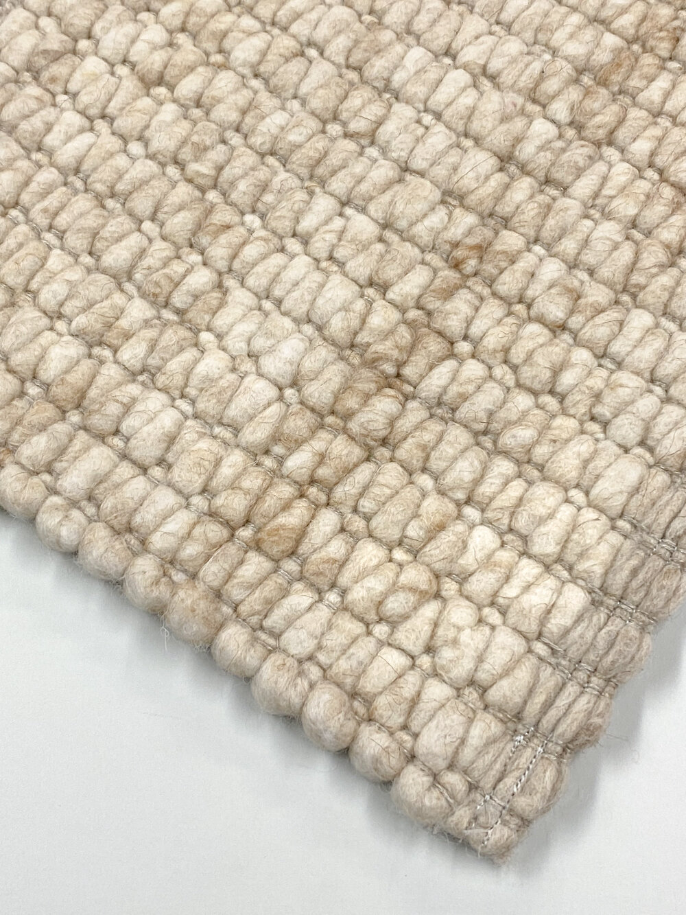 Schafwollteppich Muschel-Bindung