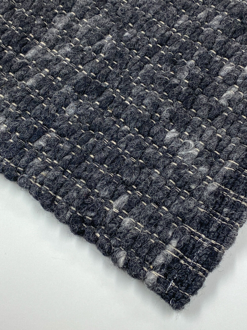 Schafwollteppich Muschel-Bindung
